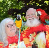 Spider, 66, and Anne Spider-McKeown, 64, from Birmingham, go about their daily routine with two parrots Charlie a green-winged Macaw and Chester, a blue-and-gold Macaw. May 19, 2024. 