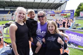Lindsey Burrow and her children - Macy, Jackson and Maya - at the finish line