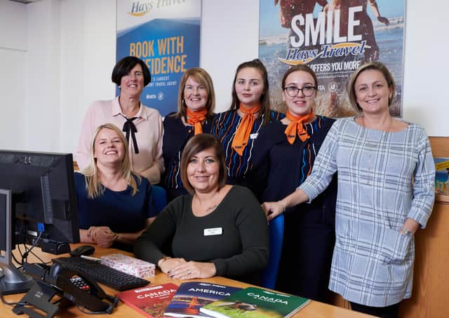 Ex-Thomas Cook staff in Castleford had their jobs saved after Hays Travel took over. Pictured are Leanne Tomlinson, Claire Hill, Karen Booth, Kelly Norton, Emily Hough , Holly Simpkins and Lisa Holdsworth.