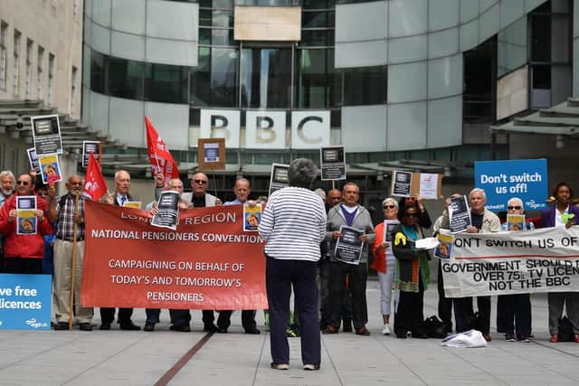 Protesters against cuts to TV licences announced earlier this year.