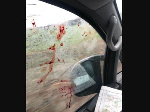 Animal rights activists have released shocking footage of a man attacking one of their vehicles with a dead fox, leaving blood and body parts on the windows, after they disrupted a hunt in Kirk Smeaton.