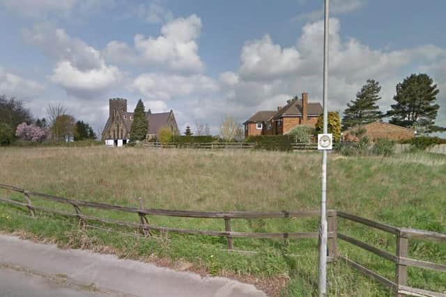 The homes would be built on this patch of land, on Darrington Road, if the plans are approved.