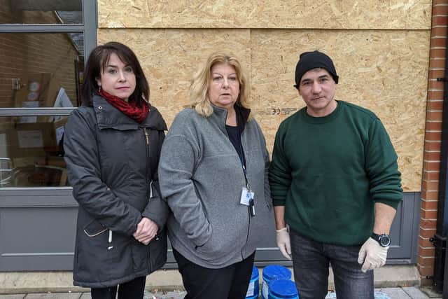 Lisa Grant, Angela Jones and Max Troisi at St Catherine's food bank, which has been the target of vandalism for the fifth time. They fear that continued attacks could force the food bank to close