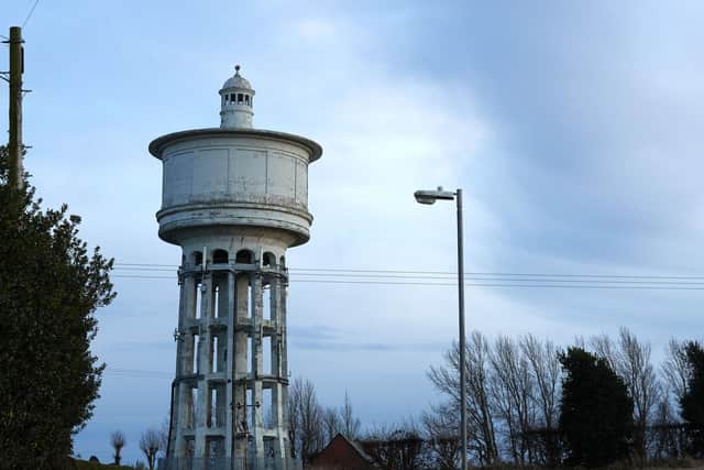 Gawthorpe Water Tower stands tall at the highest peak.