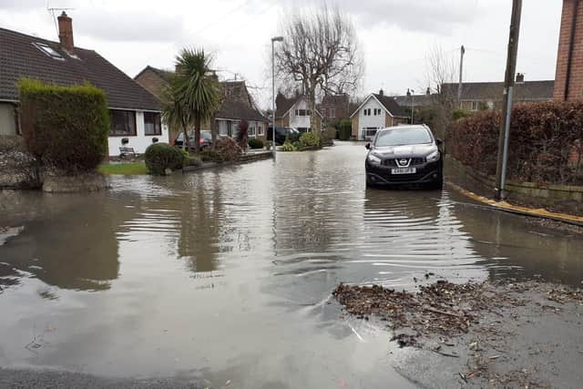 Floods on Reid Park Avenue in Horbury Bridge.