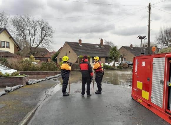 Water being pumped at Reid Park Avenue.,