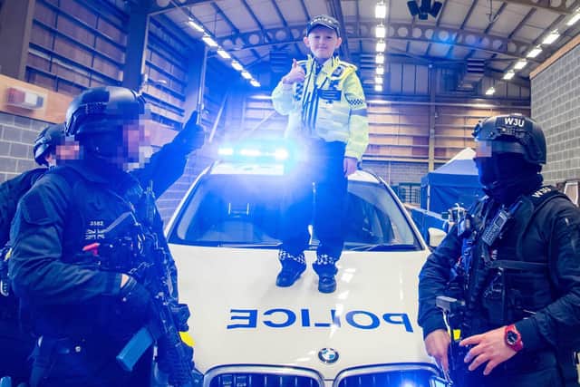 Allan Harris, from Swansea, was invited to spend a day with West Yorkshire Police at their Training and Development Centre in Wakefield, where he learned about the job - and even helped to apprehend a few criminals. Photo: Make a Wish UK