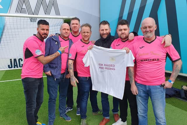 Darren Powell (left) with fellow players from The Kews and Soccer AM presenter John 'Fenners' Fendley (third from left).