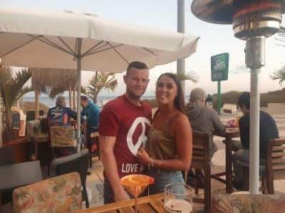 Martin and Laura Griffiths have been left stranded in Gran Canaria - more than 2,000 miles away from their children - after a sandstorm over the weekend.