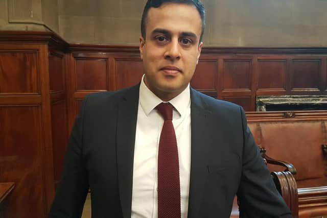 Tory group leader Nadeem Ahmed reacted angrily to jibes from Labour councillors, including one that his party's proposals were "recycled rubbish".