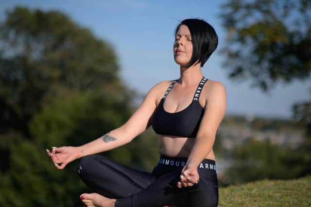 Keilly encourages healing practices like reiki and yoga in her wellness routine