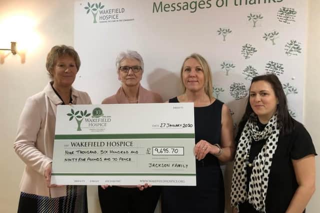 Cheque presentation with hospice director Helen Knowles, Alans widow Christine Jackson, Irwin Mitchell lawyer Lucy Andrews, and Alans daughter-in-law Georgina Jackson.