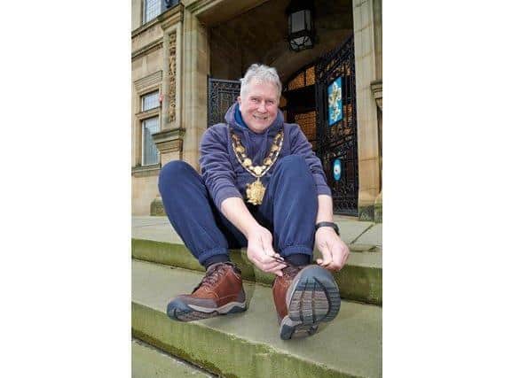 Councillor Charlie Keith laced up his hiking boots and began his trek on Tuesday, striding from Castleford to Pontefract.