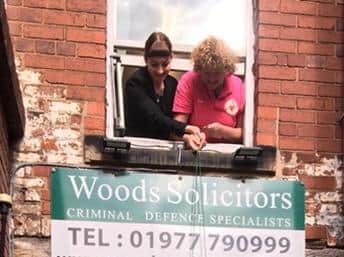 A team of solicitors are helping to feed the homeless by using an old fashioned bucket pulley system