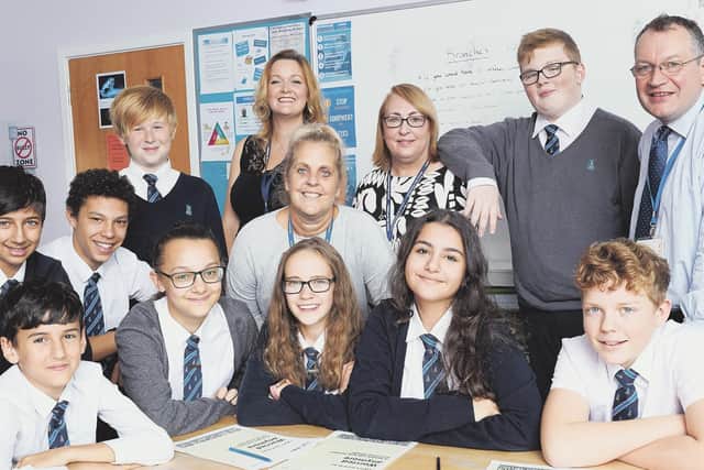 Closure: Tudor Griffiths, far right, with pupils at Kettlethorpe High School