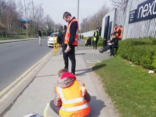 One picture circulating on social media showed workers having to take lunch on the pavement outside.