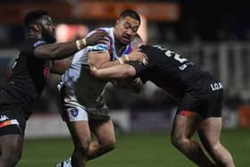 WRAPPED UP: Wakefield's Tinirau Arona is tackled by Bradford's Levy Nzoungou and Ebon Scurr during the Challenge Cup win.Picture Jonathan Gawthorpe13th March 2020.
