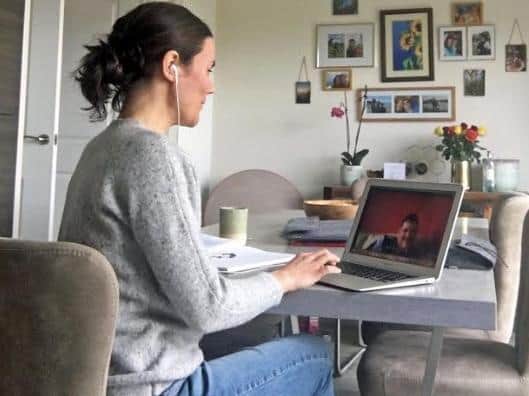 Paragon Veterinary Referrals internal medicine specialist, Andrea Holmes, carries out a video consultation from home.