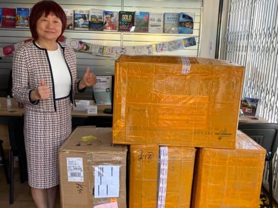 Councillor Samantha Harvey with the newly imported supplies from Nanning City.