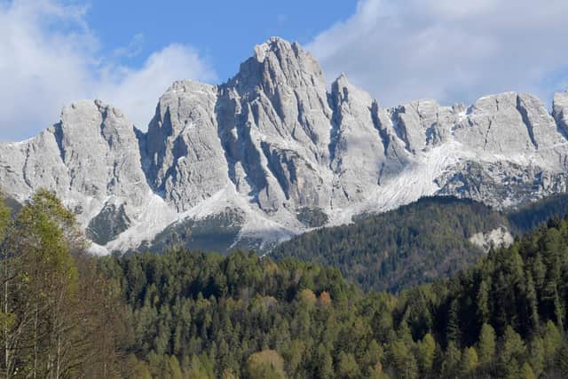 As an escapee, Mr Mountain  walked about 80 miles through the Dolomites. About 20 miles from Switzerland they bumped into partisans who took them to the border.