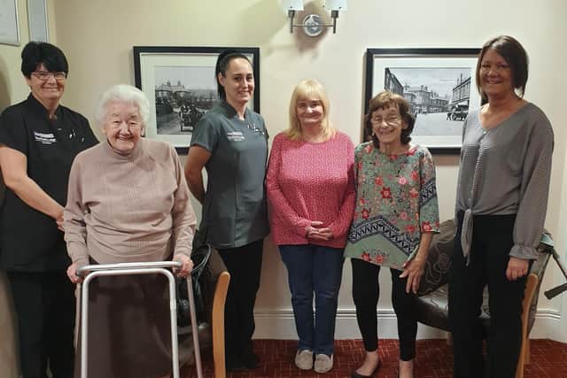 Some staff and residents at Newfield Lodge before social distancing rules came into play