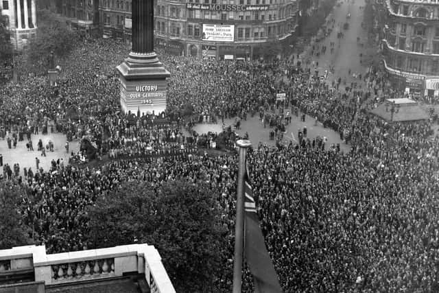 Thousands of people gather in Trafalgar Square in May 1945 as it's revealed the War in Europe is at an end.