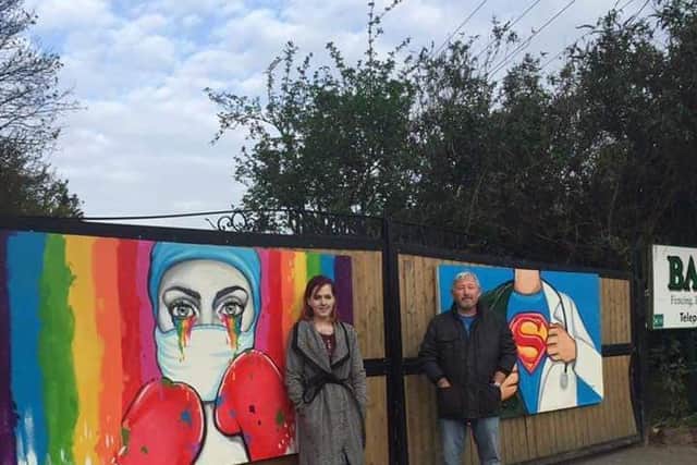 Team, Andy Barker and Rachel List, pictured with the murals to be auctioned off to raise money for the NHS and the Prince of Wales Hospice