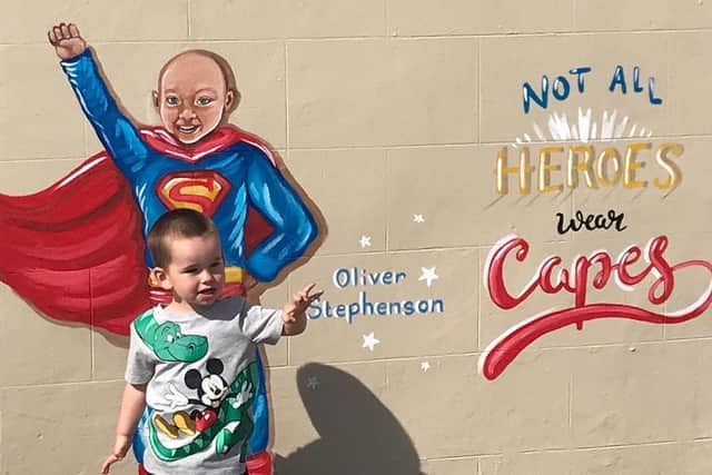 As soon as we got close to the mural, Alfie knew it was his big brother who he misses so much, he got up and started jumping around."