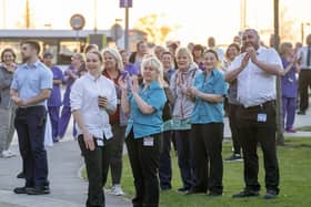 NHS staff cheer an applaud outside Pinderfields Hospital during the national Clap for Our Carers event in April 2020.