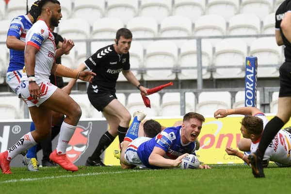 Jack Croft scores on his Trinity debut in a Cup tie at St Helens last season. Picture by Jonathan Gawthorpe.