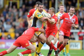 Craig Huby takes on the Salford defence during a game for Castleford in 2013. Picture by Simon Hulme.