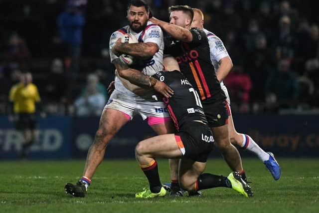 Dave Fifita attacks the Bradford Bulls defence during a Challenge Cup tie in March, Trinity's final game before the shutdown. Picture by Jonathan Gawthorpe.