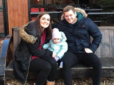 Ossett couple Robyn Simister and Andrew Johnson with their daughter Ivy.