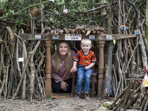 Four-year-old Rory Kibler, pictured with mum, Sarah, built his retreat in the woods at Allerton Bywater in recent months to help beat lockdown boredom.