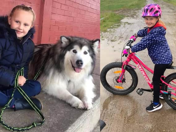 Brooke Brightmore, a 7-year-old from Featherstone, has cycled 50 miles over the course of June to help her family's husky rescue charity