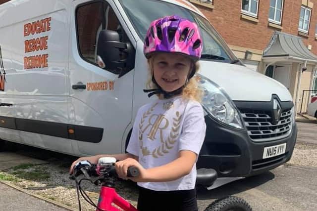 Brooke Brightmore, a 7-year-old from Featherstone, has cycled 50 miles over the course of June to help her family's husky rescue charity