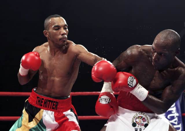Finest hour:  Junior Witter (L) and DeMarcus Corley throw punches during the WBC light-welterweight fight on September 15, 2006 at Alexandra Palace in London, England.  (Picture John Gichigi/Getty Images)