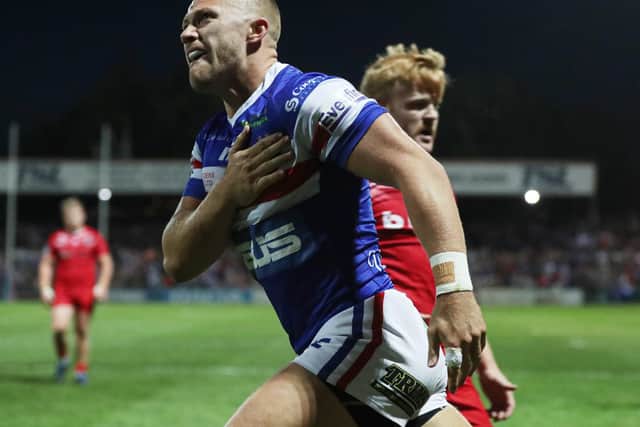 Wakefield Trinity's Ryan Hampshire celebrates scoring the first try in last season's promotion decider with London Broncos. Picture: Oskar Vierod/SWpix.com.