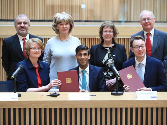 Wakefield Council leader Denise Jeffery with other council leaders Chancellor Rishi Sunak and Simon Clarke MP after the signing of the West Yorkshire Combined Authority devolution in March