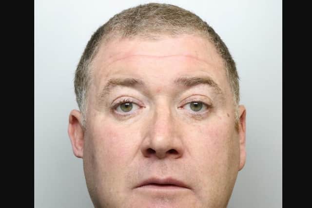 Mark Hopkins, 48, from Pontefract, is wanted by police over a domestic violence offence on suspicon of assault.
