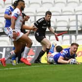 Jack Croft scores on his Trinity debut, away to St Helens last season. Picture by Jonathan Gawthorpe.