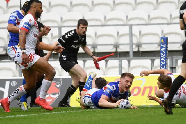 Jack Croft scores on his Trinity debut, away to St Helens last season. Picture by Jonathan Gawthorpe.