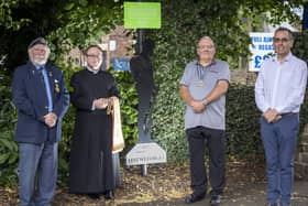 John Lockwood, Father Christopher Johnson, Malcom Patterson and Darren Byford with the 'Tommy' statue that has been installed in Horbury Memorial Park.
