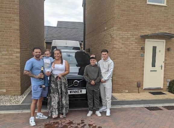 Celebration: Claire Reynolds and her partner Ben Binks will be moving into the four bedroom house in Ossett with children Alfie, 15, Riley, 13 and two-year-old Hudson-Boe.