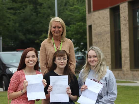 Group Shot: College Principal Sam Wright pictured with students Joely Rigby, Hannah Wilby and Drew Lewis