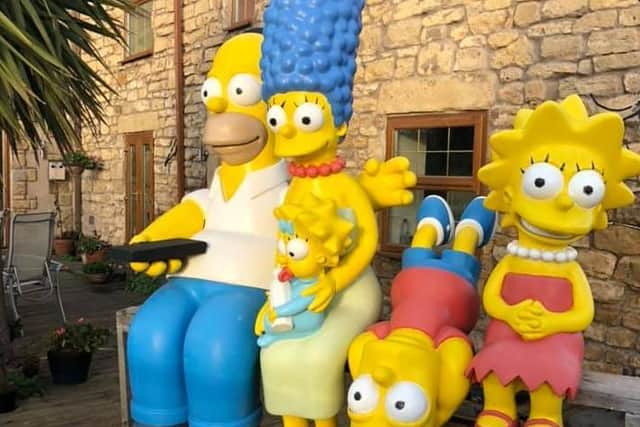 The Simpsons statues had been at home in Markk White's garden for 15 years, but were stolen last month.