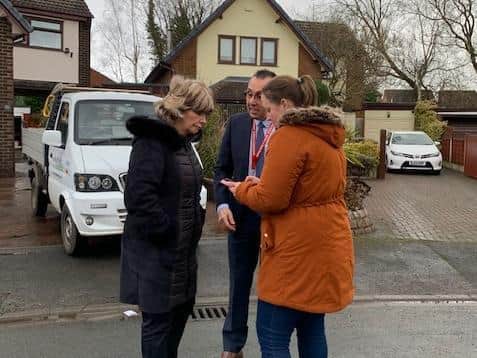 Horbury councillor Darren Byford and council leader Denise Jeffery speaking to residents after the flooding in February.