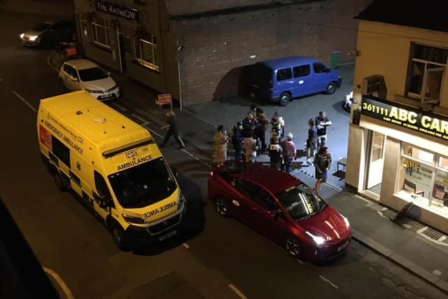 Police have launched an investigation into an assault on a taxi driver on a busy Wakefield street.