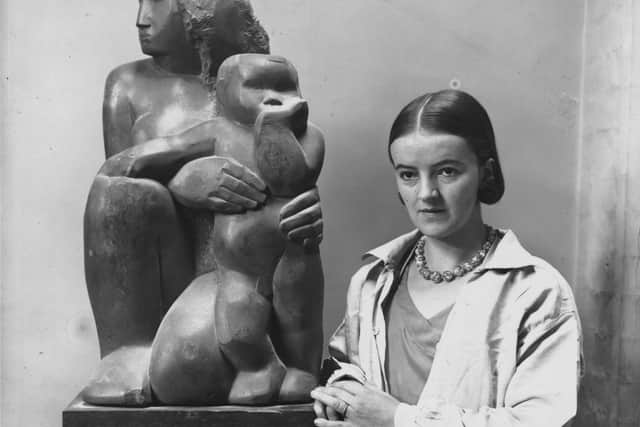 British sculptor Barbara Hepworth (1903 - 1975) with her work 'Mother and Child'. (Photo by Fox Photos/Getty Images)