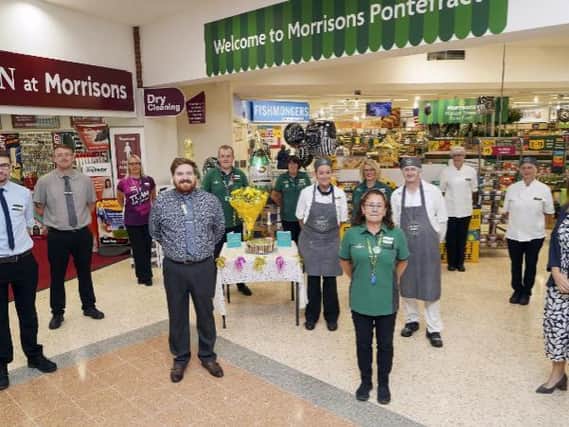 Staff rejoice with customers and long serving employees as the store celebrate 30 years in our community